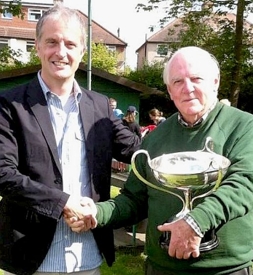 Don Wales hands the Malcolm Campbell trophy to Mike Dean