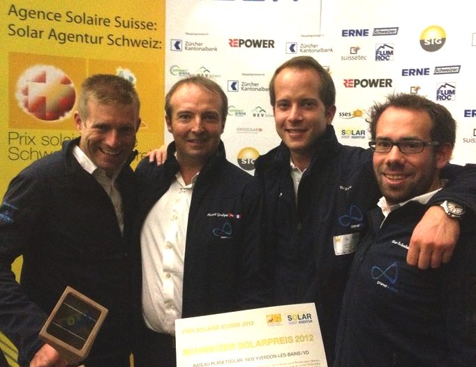 Crew of the Turanor PlanetSolar receiving a prize from Solar Agentur Scweiz