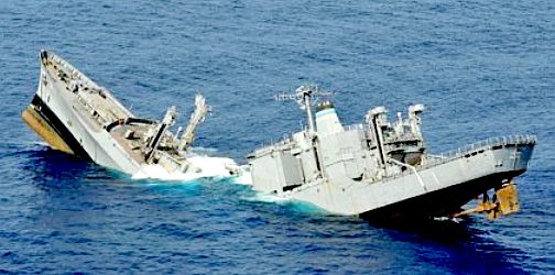 Navy ship sinking after torpedo attack