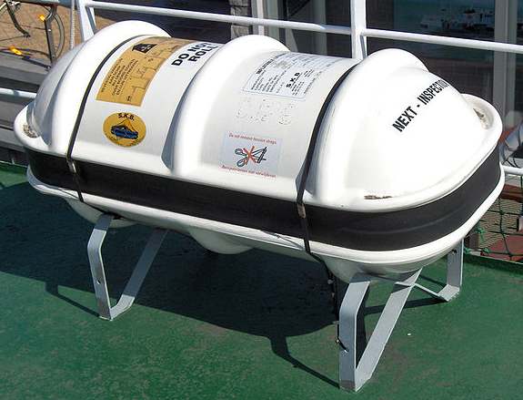 An inflatable liferaft container on board ship