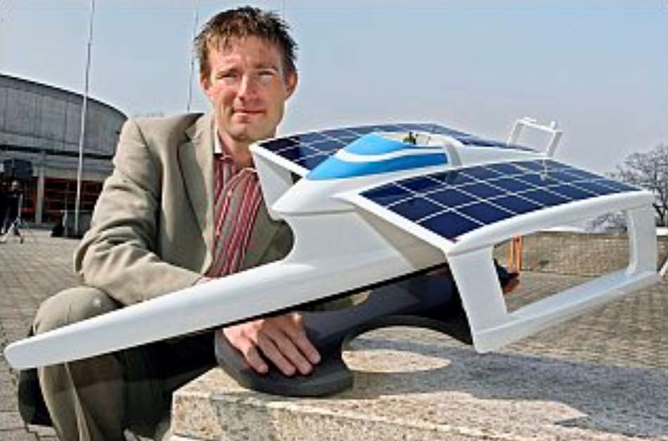 Raphael Domjan with the original PlanetSolar model trimaran