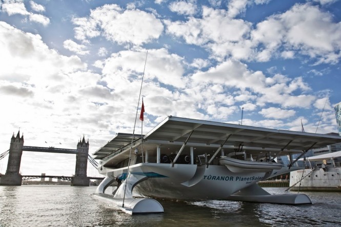 PlanetSolar approaching Tower Bridge in London