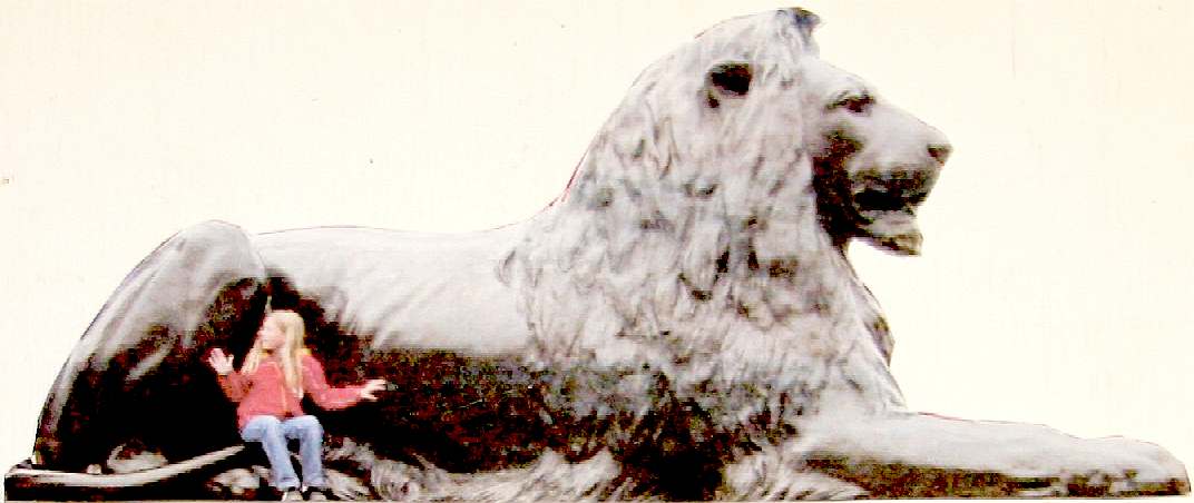 A photograph of one of the lions at Trafalgar Square in London