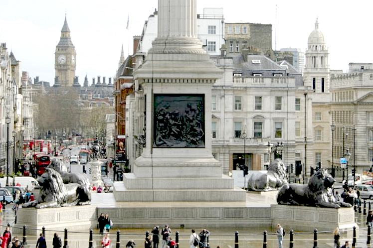 Trafalgar Square in London, with Big ben in the distance