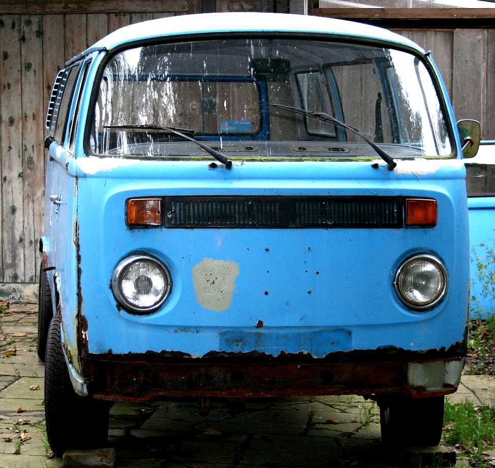 VW kombi van or camper wagon with a bay window.