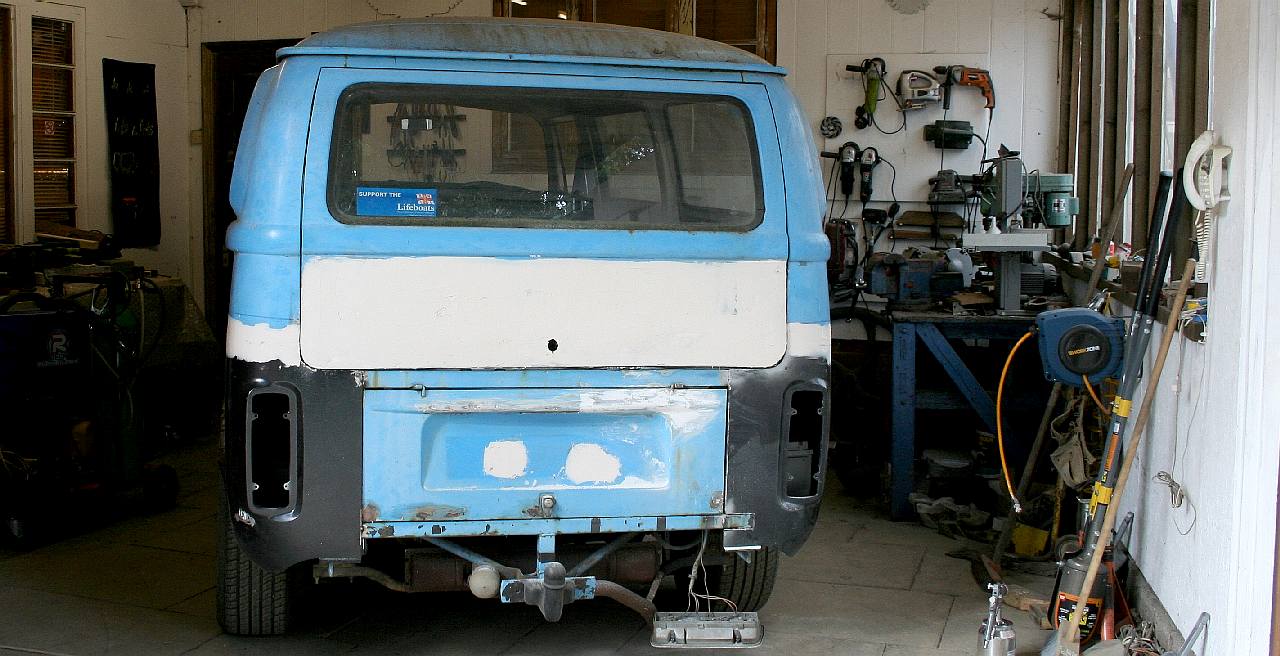 VW camper tailgate filled with polyester filler paste in storage