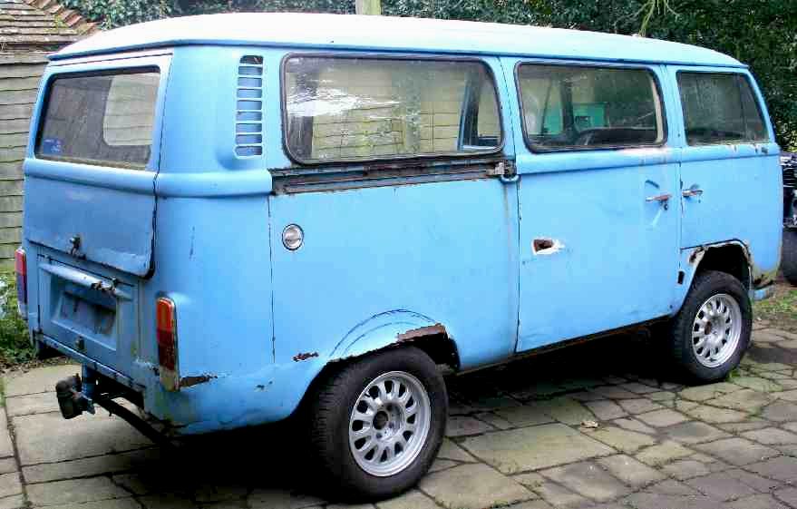 VW camper fitted with wide alloys on adapters