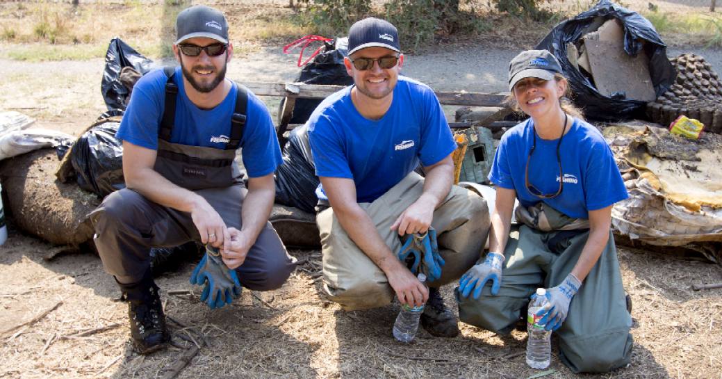 FISHBIO volunteers clean the Comanche Creek