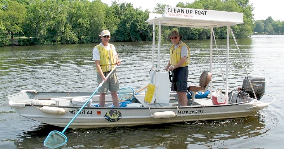 Tom McNichol captains the clean up boat