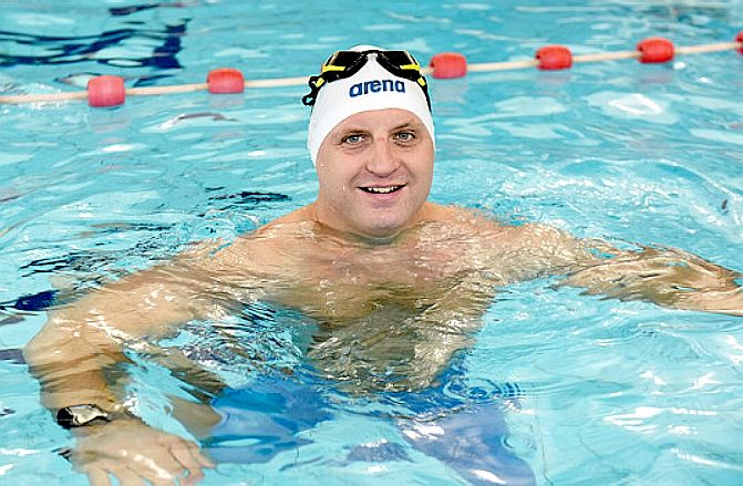 Ben Hooper in a swimming pool