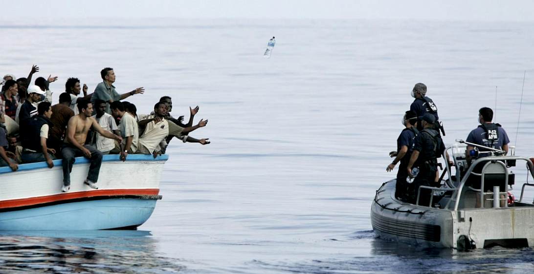 Migrants rescue mission Malta, water bottles